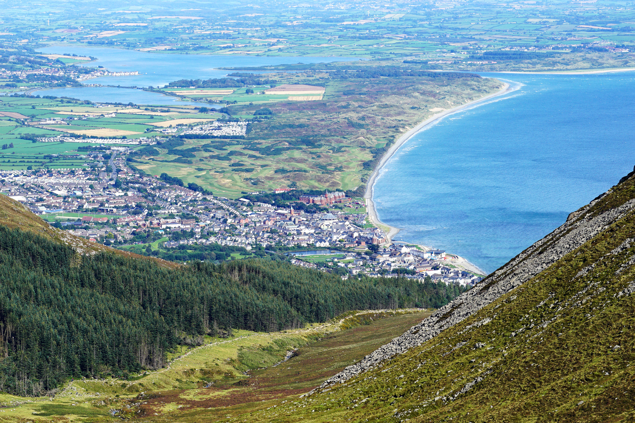 Newcastle from The Mourne Mountains. Newcastle is seaside resort town in County Down, Northern Ireland